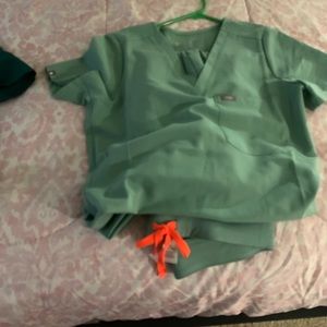 XSMALL PETITES Figs Sage color limited edition. Small stain on pant leg. RARE